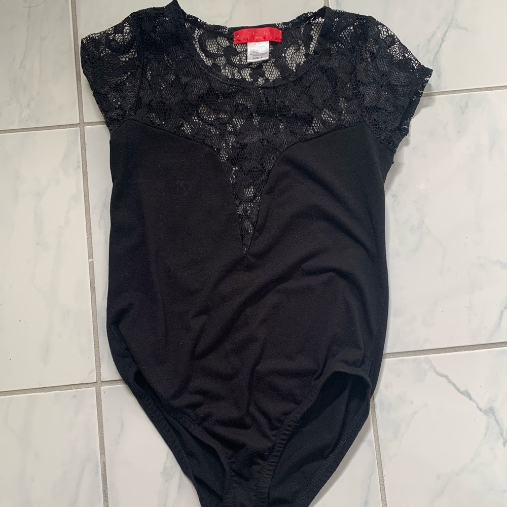 Black short-sleeve body suit with lace.
